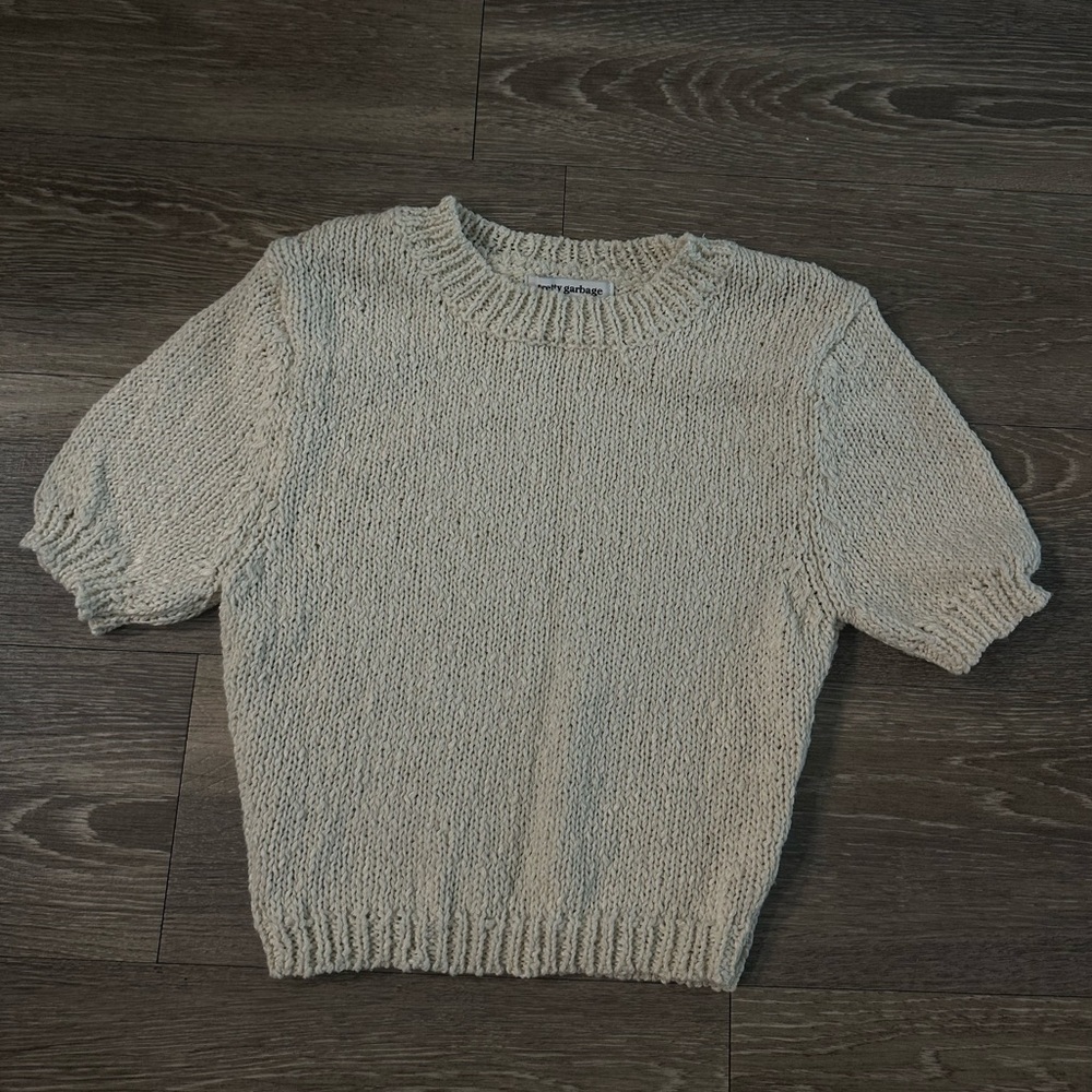 Knitted cream tee shirt in size small